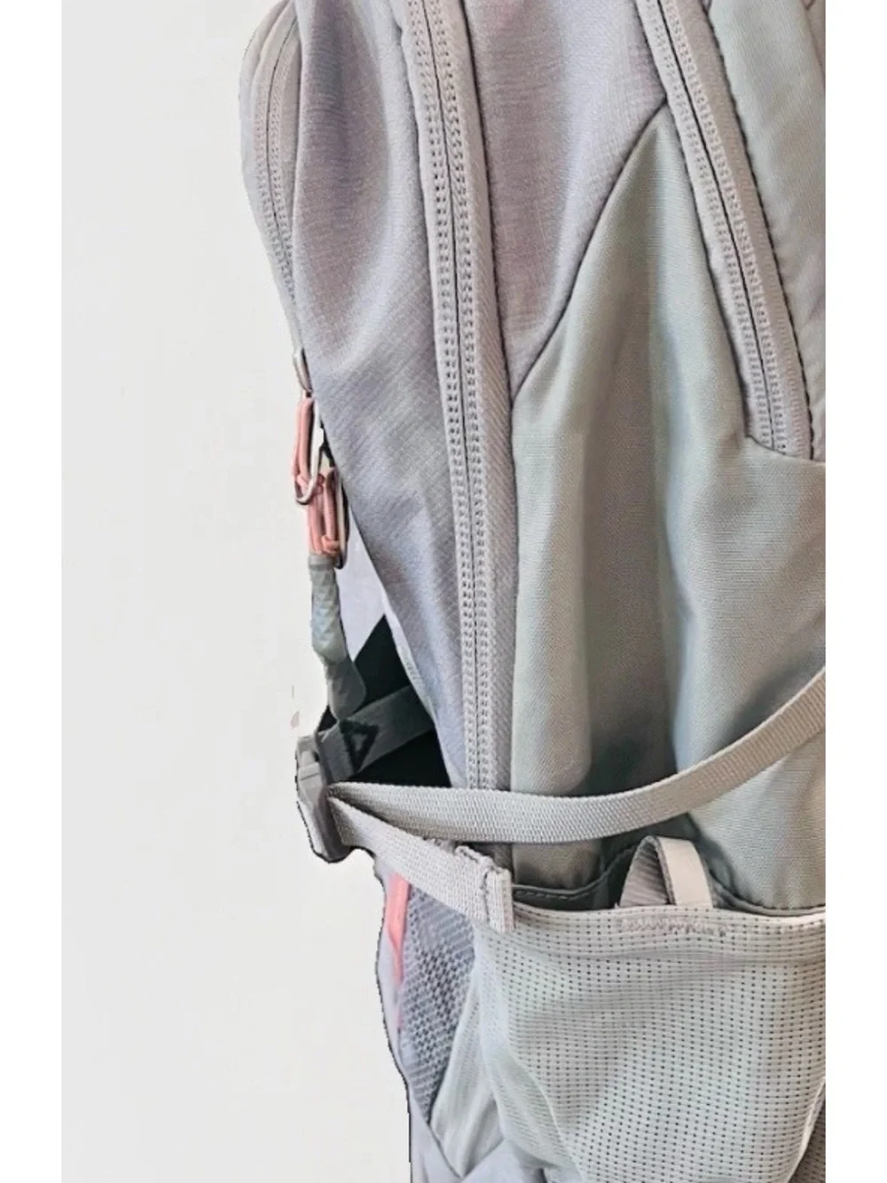 The North Face women’s Gray Backpack with Rose Accent